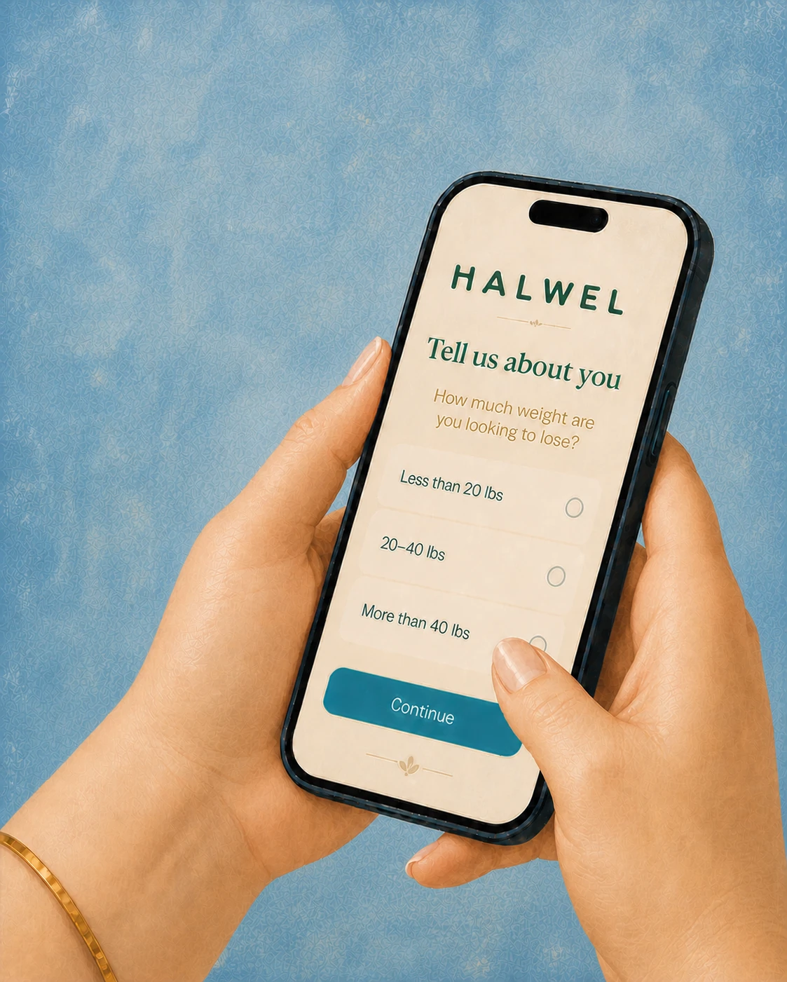 Hands holding a phone showing the Halwel intake questionnaire
